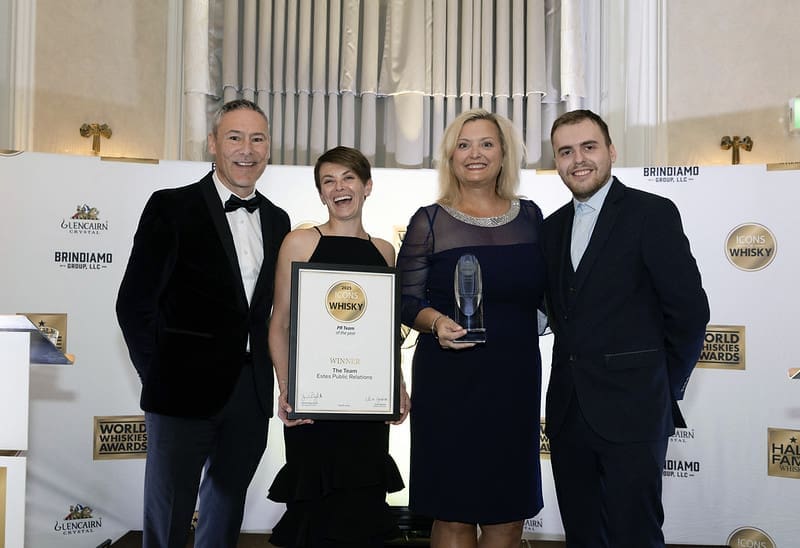Jamie Estes and Tracy Green accept the 2025 Icons of Whisky Award in London, England